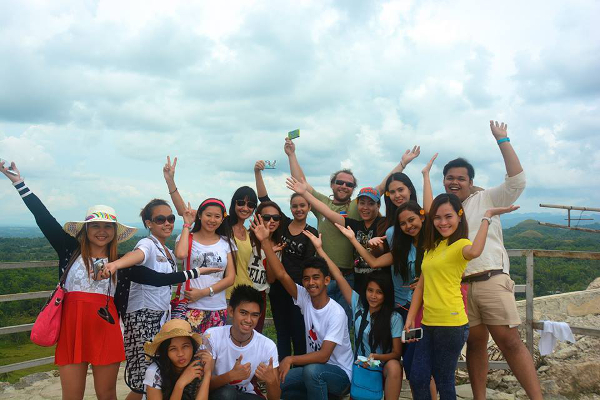 Endangered Species Condoms in Chocolate Hills, Bohol, Philippines with Philippines Communitere Founder and Executive Director Sam Bloch. Photographed by Allison Hanes.